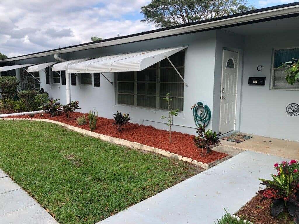 Photo of 405 N High Point Boulevard #C, Delray Beach, FL 33445 (MLS # R11067492)