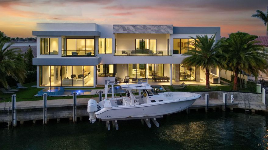 Welcome to 749 Bamboo Drive, a contemporary waterfront masterpiece located in the prestigious Sun & Surf enclave of East Boca Raton. Built in 2023 and offered fully furnished, this exceptional residence encompasses 7,502 square feet of sophisticated interior living space with 6 bedrooms and 8 bathrooms, blending modern elegance with seamless functionality. Perfectly positioned on 132 feet of waterfront with direct ocean access, this home is ideal for the boating enthusiast and offers the ultimate South Florida lifestyle.    Designed for both grand entertaining and everyday luxury, the residence features open, light-filled interiors, soaring architectural lines, and a seamless indoor-outdoor flow. The chef's kitchen is a true showpiece, appointed with a 72-inch Sub-Zero refrigerator,  6-burner Wolf gas range, dual Wolf wall ovens, and a 57-inch Ruvati two-tier workstation sink, creating an exceptional culinary environment.    Outdoor living is equally impressive, with expansive waterfront vistas, exceptional dockage potential, and rare walkability to the beach. Located just moments from The Boca Raton and its Beach Club, this residence offers unmatched proximity to Boca Raton's finest dining, golf, and resort amenities. A rare opportunity to own a turnkey new construction waterfront estate in one of East Boca Raton's most exclusive neighborhoods.