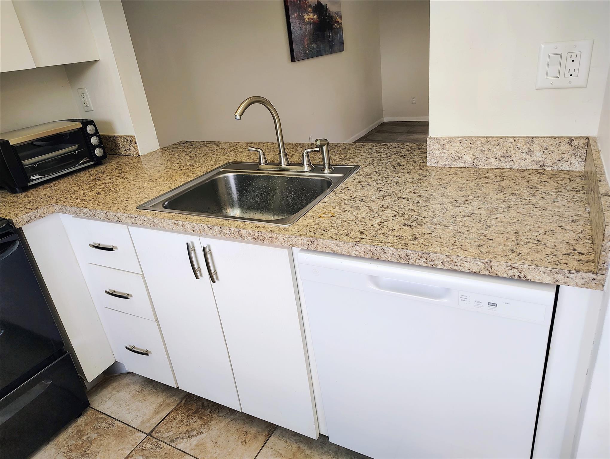 Beautiful 1-bedroom, 1-bath condo in a desirable 55+ community! This charming unit features updated flooring, enjoy stunning golf course views from every room, updated kitchen and bath, washer and dryer in the unit, steps away from elevator. Offered at an unbeatable price of just $69,000, this is a perfect opportunity to own in a well-kept community! Amenities include: swimming pools, hot tub & spa, ballroom, fully equipped gym, billiard room. Active community with several social events! Close to entertainment, restaurants, airport, highways, shopping and more!