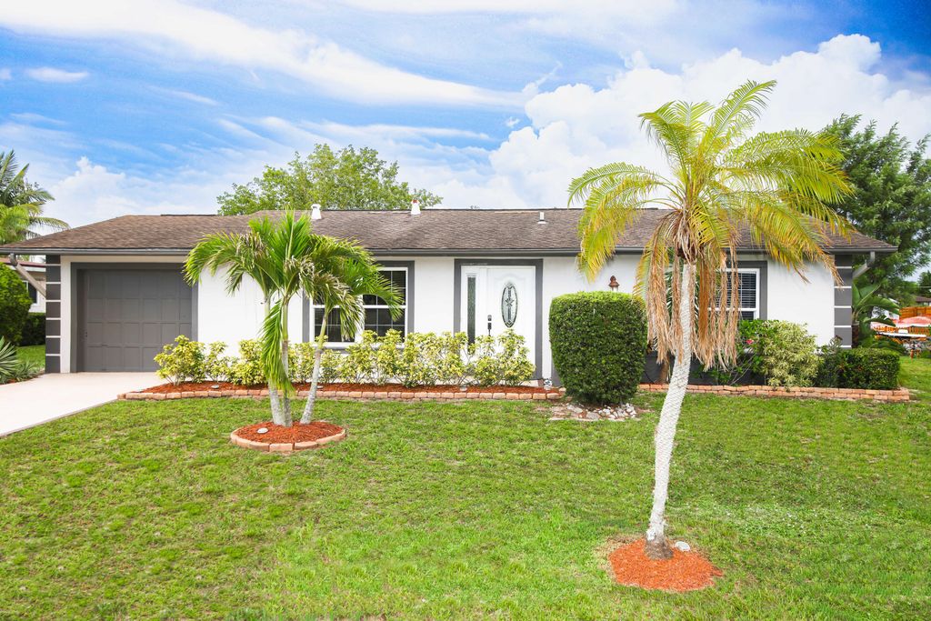 Photo of 733 SE Calmoso Drive, Port Saint Lucie, FL 34983 (MLS # R10806415)