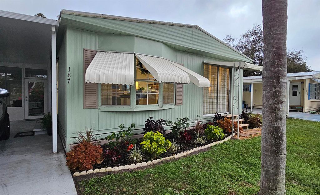 Photo of 187 W Caribbean, Port Saint Lucie, FL 34952 (MLS # R11079894)