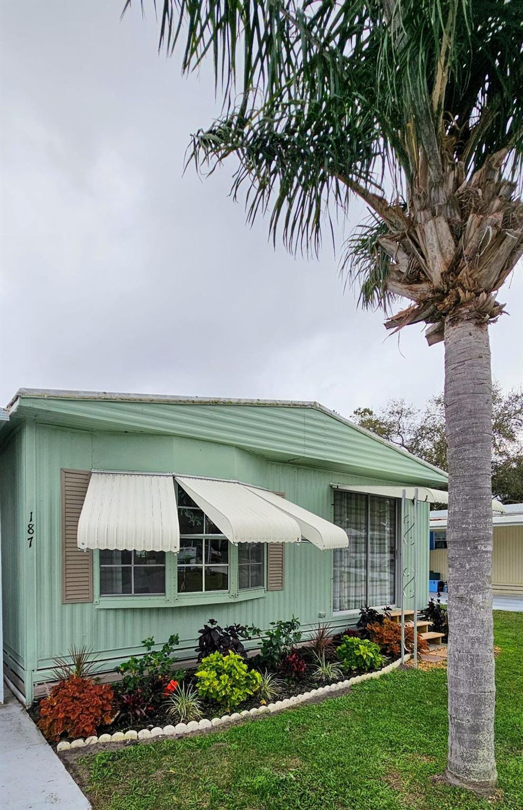 Photo of 187 W Caribbean, Port Saint Lucie, FL 34952 (MLS # R11079894)