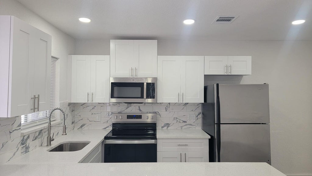 Photo of 618 SW 14TH Terrace #2, Fort Lauderdale, FL 33312 (MLS # B26064189)