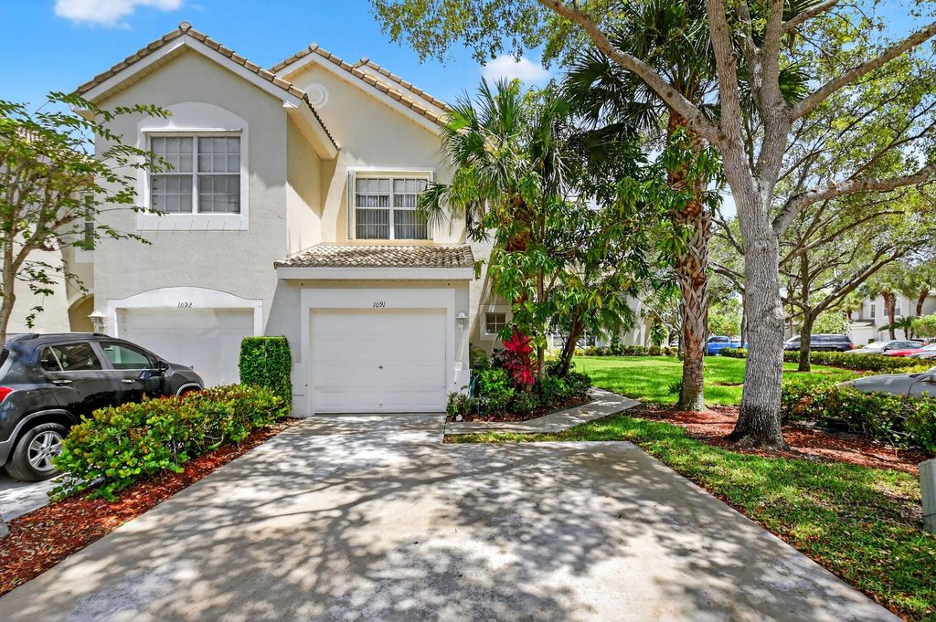 Photo of 1091 Woodfield Road, Greenacres, FL 33415 (MLS # R11112865)