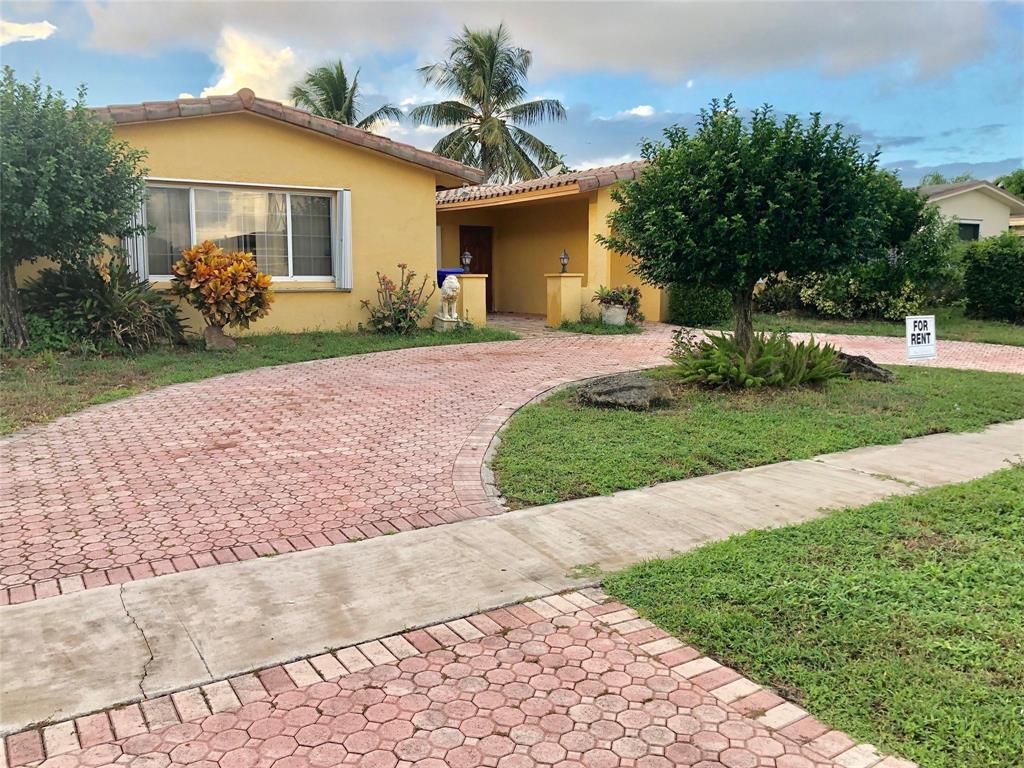 Photo of 2180 NW 93rd Avenue, Pembroke Pines, FL 33024 (MLS # B26011231)