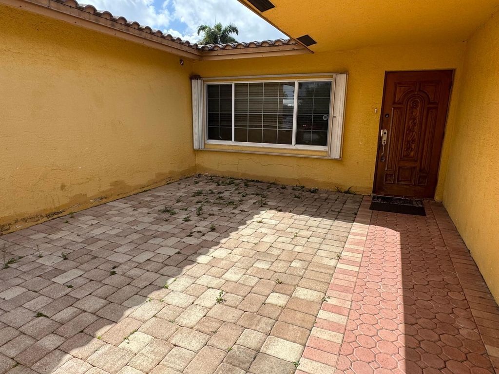 Photo of 2180 NW 93rd Avenue, Pembroke Pines, FL 33024 (MLS # B26011231)