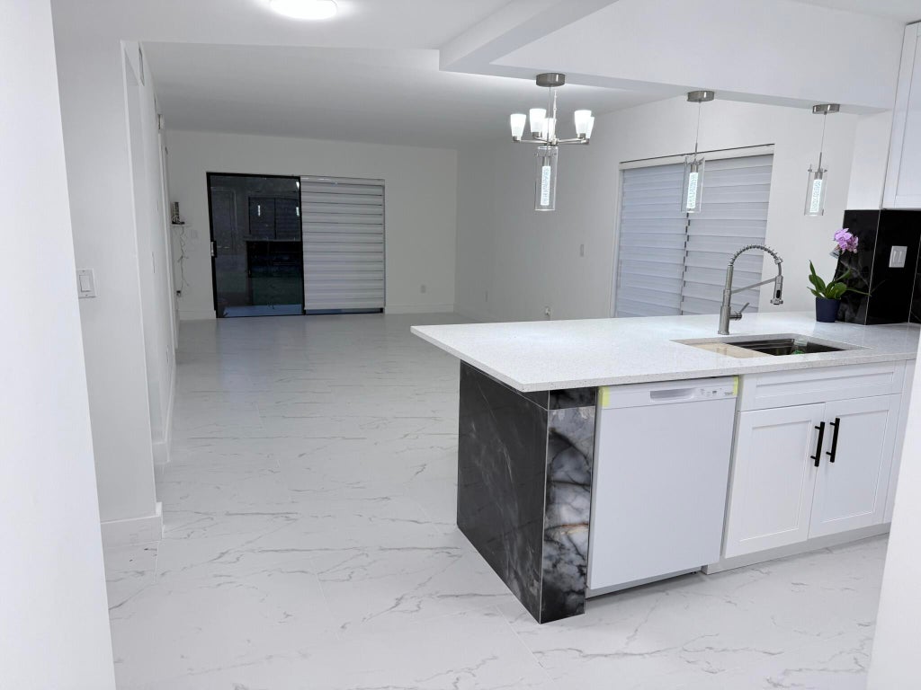 Photo of 300 E Club Circle #107, Boca Raton, FL 33431 (MLS # B26044168)