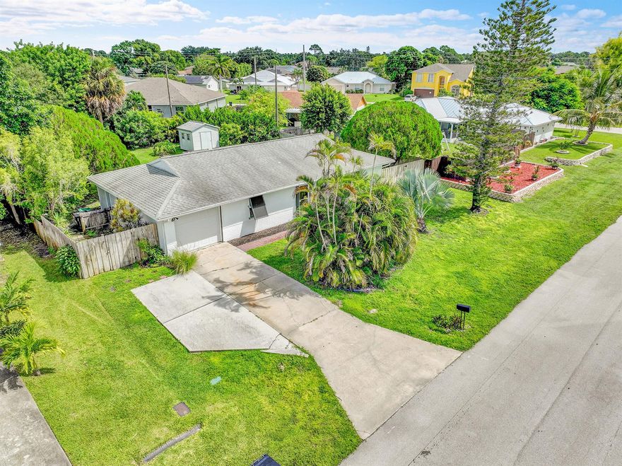Charming 2-bedroom, 2-bath home with 1-car garage in highly sought-after Port St. Lucie! Freshly painted and featuring elegant plantation shutters, this home offers a bright and inviting interior. Enjoy the Florida lifestyle with a spacious screened patio overlooking a beautiful, large, fenced yard--perfect for relaxing or entertaining. Located in a desirable neighborhood, just minutes from highways, shopping, and dining. A must-see opportunity!