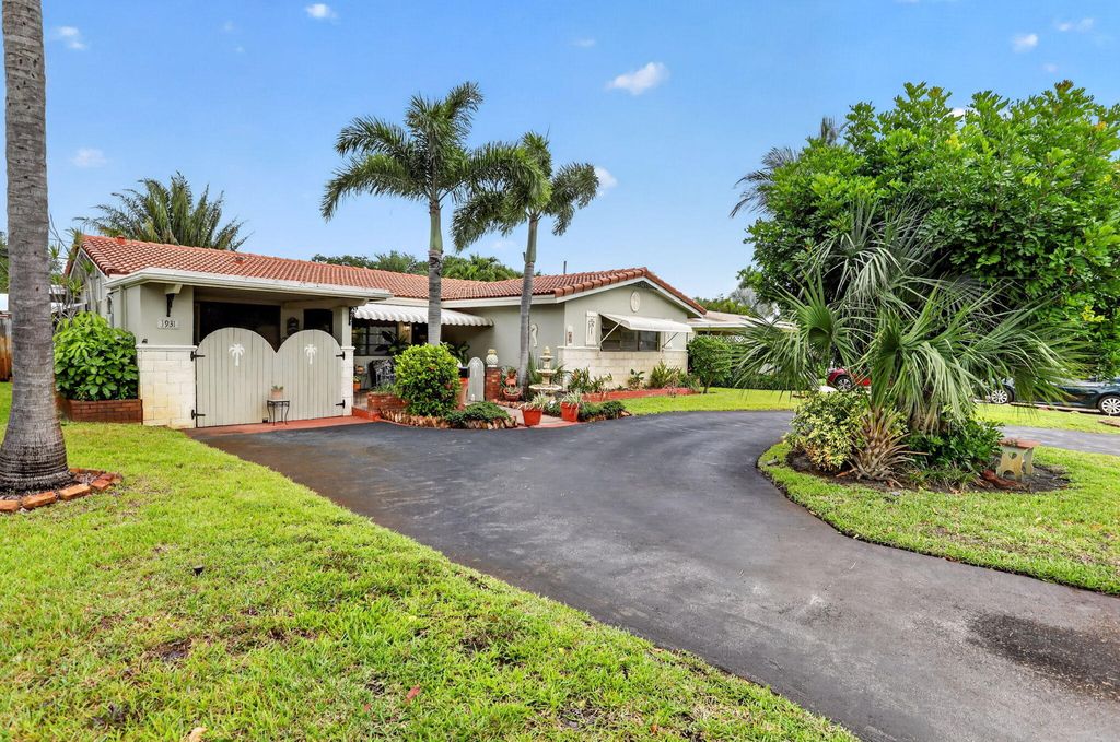 Photo of 1931 NE 27th Street, Lighthouse Point, FL 33064 (MLS # B26014899)