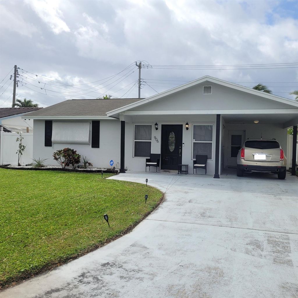 Photo of 906 Pine Tree Drive, Lantana, FL 33462 (MLS # R11074638)