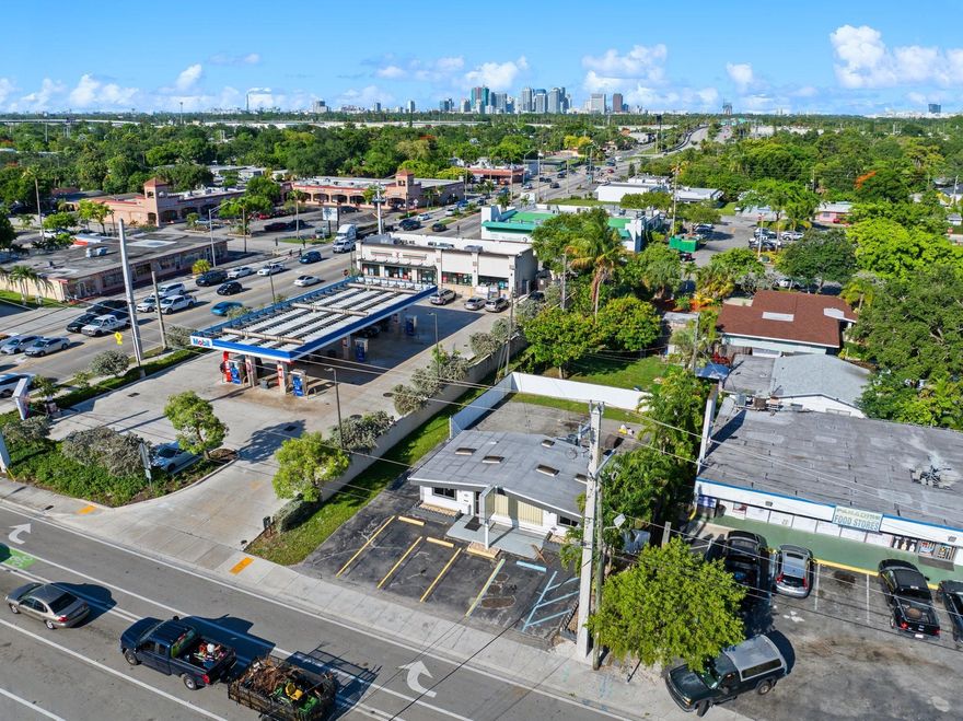 Freestanding commercial building on oversized lot with abundant parking and/or outdoor storage. Prime B-1 zoning on high-traffic corridor offers excellent visibility and flexibility. Interior features a spacious entry/reception area, two private rooms ideal for offices or conference space, and a stylish kitchen area. Natural light pours in through multiple skylights, creating an open and inviting feel. Central A/C, well maintained, and ready for your business. Don’t miss this opportunity to own a versatile property in a high-demand location!
