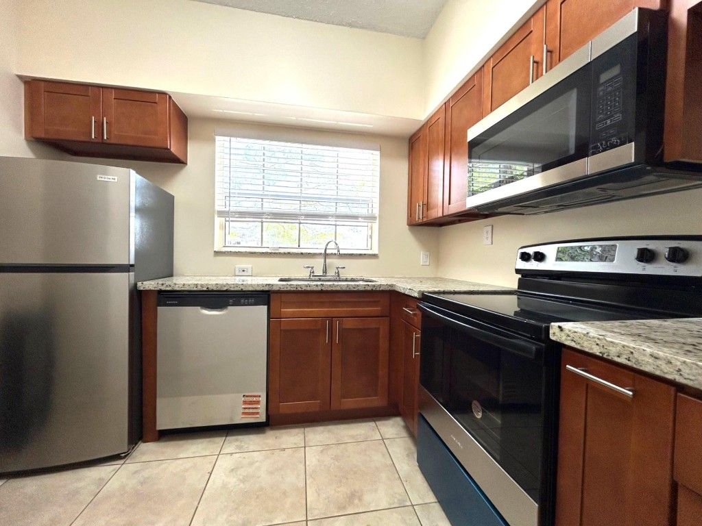 Photo of 680 Cypress Club Way #J, Pompano Beach, FL 33064 (MLS # F10496673)