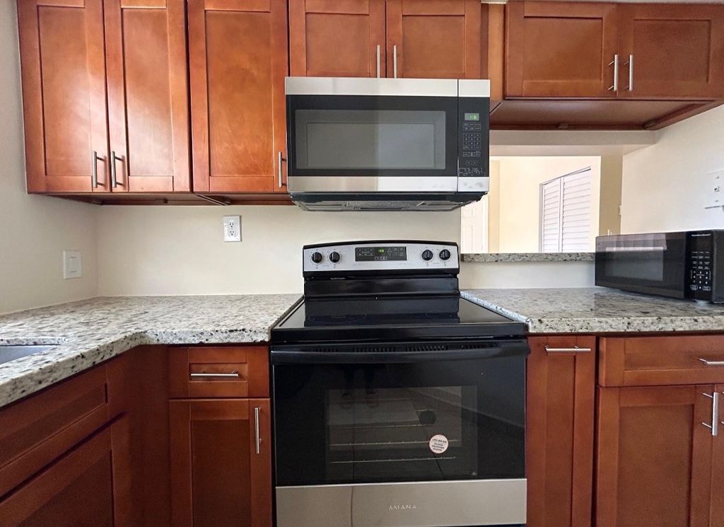 Photo of 680 Cypress Club Way #J, Pompano Beach, FL 33064 (MLS # F10496673)