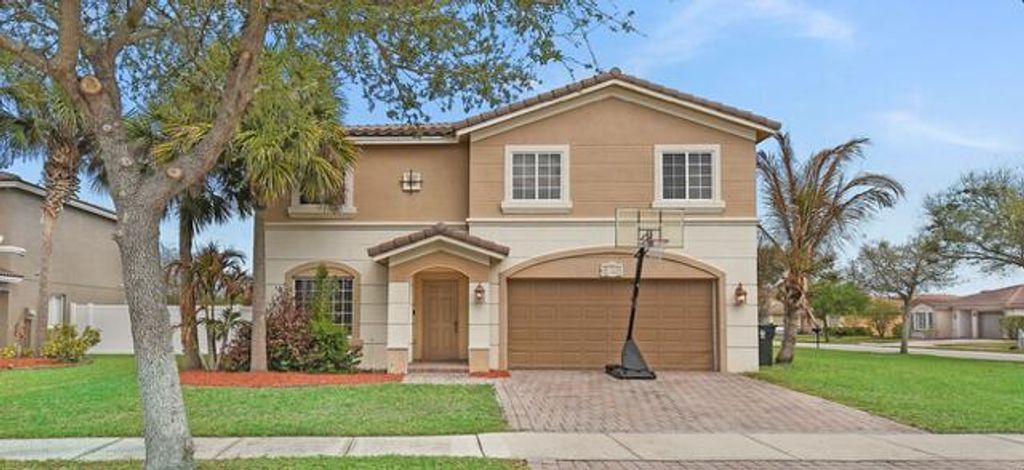 Photo of 2883 SW Cape Breton Drive, Port Saint Lucie, FL 34953 (MLS # B26007548)