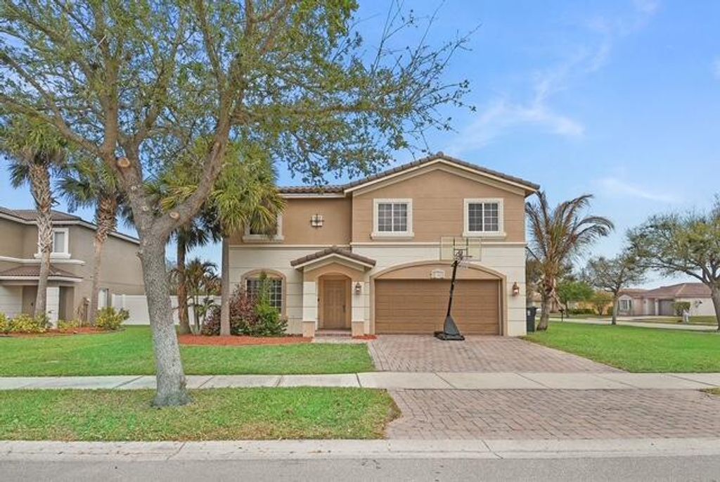 Photo of 2883 SW Cape Breton Drive, Port Saint Lucie, FL 34953 (MLS # B26007548)