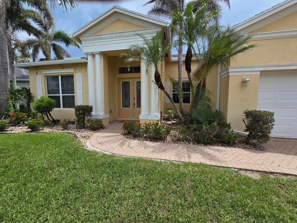 Photo of 521 SW LAKE MANATEE Way, Port Saint Lucie, FL 34986 (MLS # B26070702)