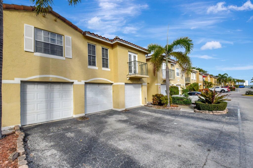 Photo of 1125 Lake Shore Drive #203, Lake Park, FL 33403 (MLS # R11123962)