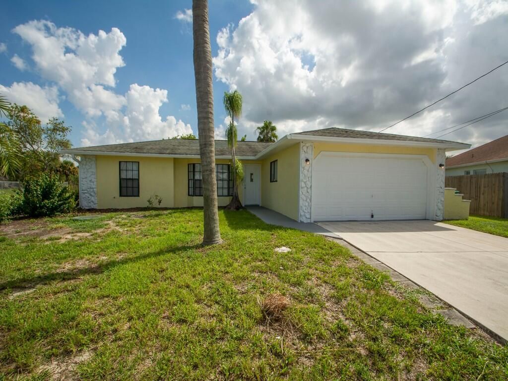 Photo of 698 SW Jeanne Avenue, Port Saint Lucie, FL 34953 (MLS # R10947303)