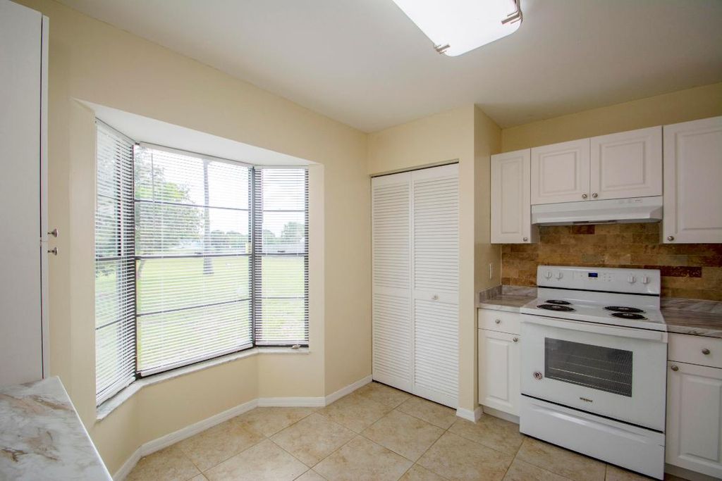 Photo of 698 SW Jeanne Avenue, Port Saint Lucie, FL 34953 (MLS # R10947303)