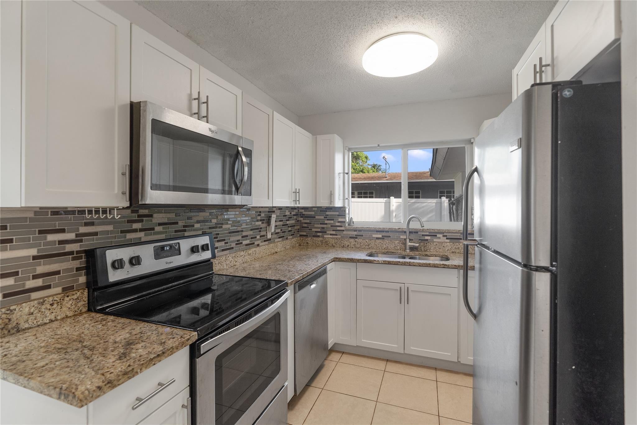 View photos, virtual tours, details... 2001 NW 14TH Avenue
