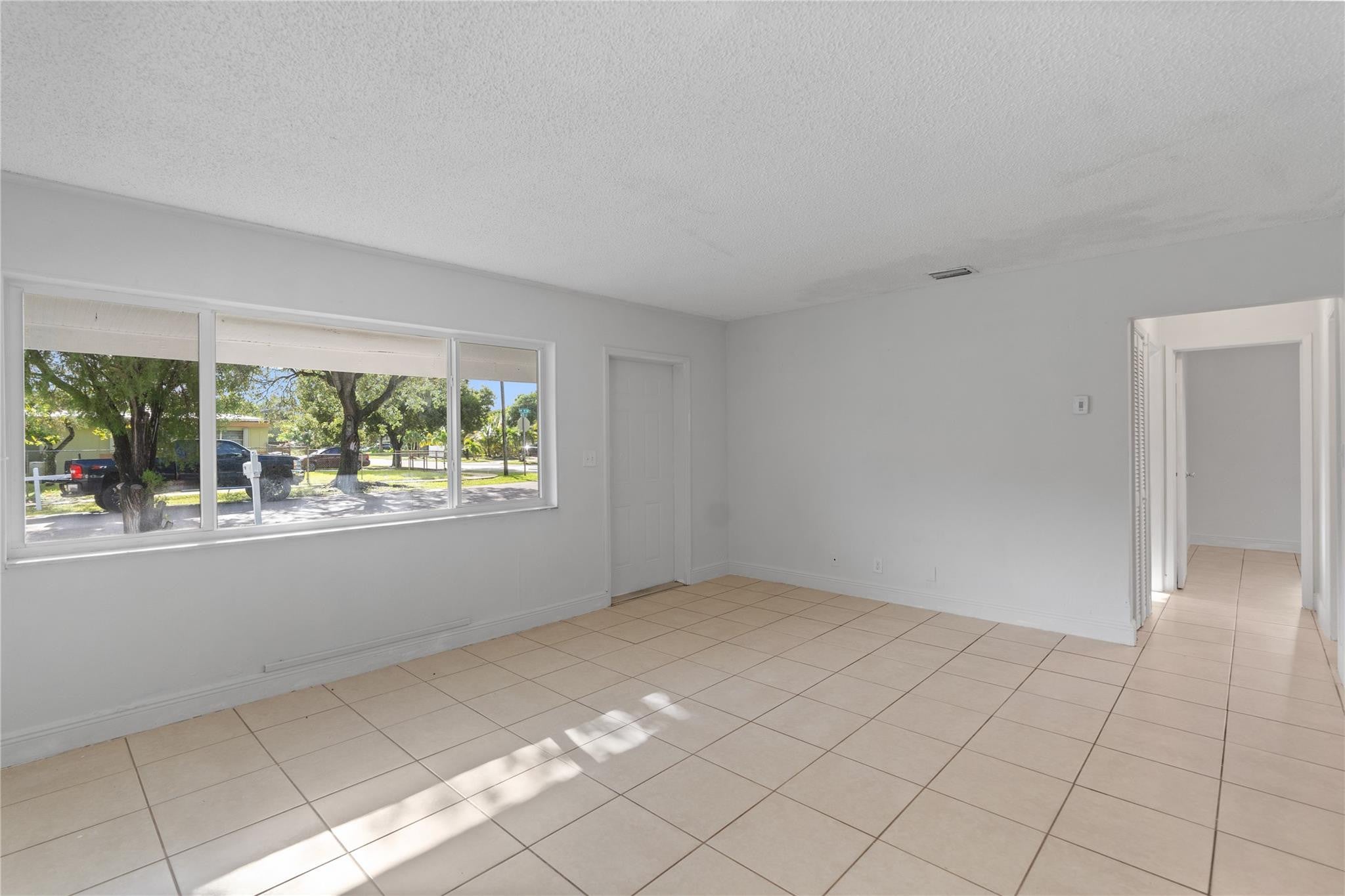 View photos, virtual tours, details... 2001 NW 14TH Avenue