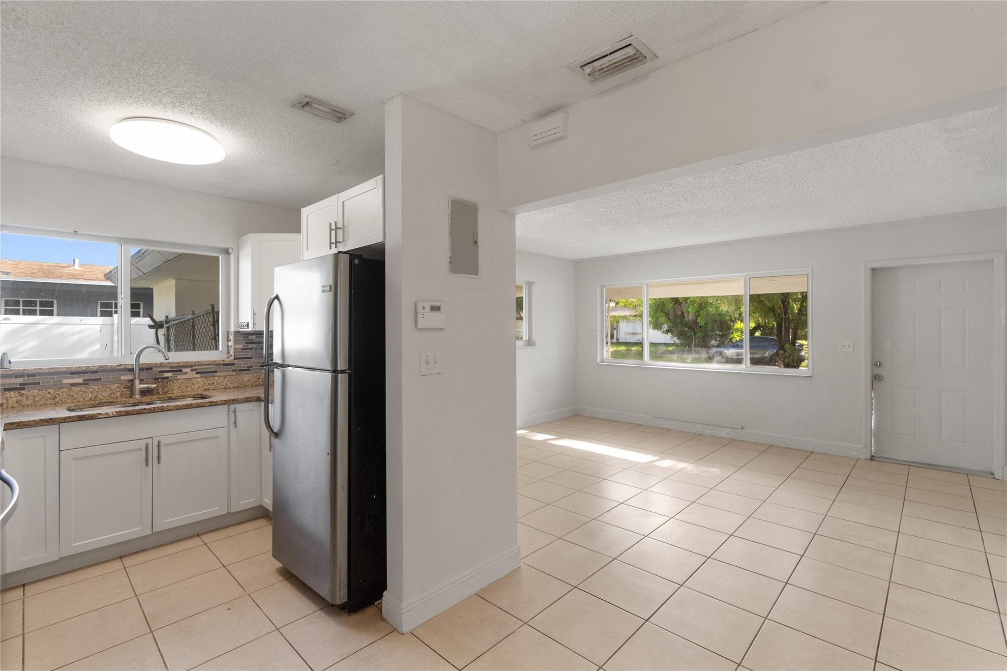View photos, virtual tours, details... 2001 NW 14TH Avenue