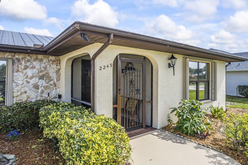 Photo of 2249 SE Leithgow Street, Port Saint Lucie, FL 34952 (MLS # R10955534)