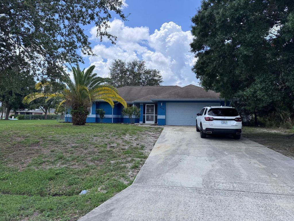 Photo of 908 SW Connecticut Terrace, Port Saint Lucie, FL 34953 (MLS # R11094490)