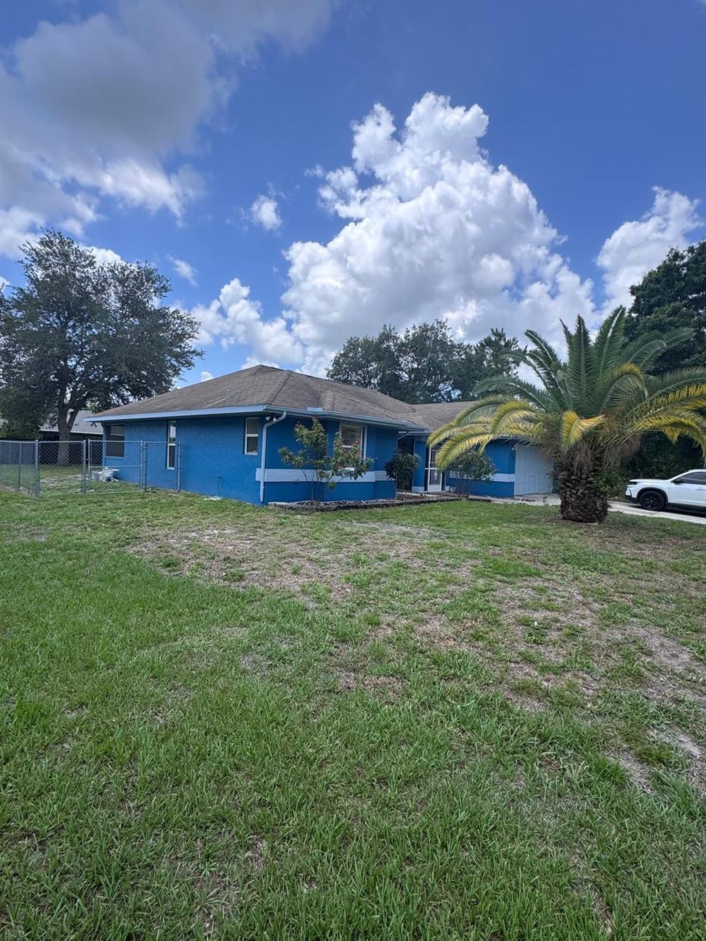 Photo of 908 SW Connecticut Terrace, Port Saint Lucie, FL 34953 (MLS # R11094490)