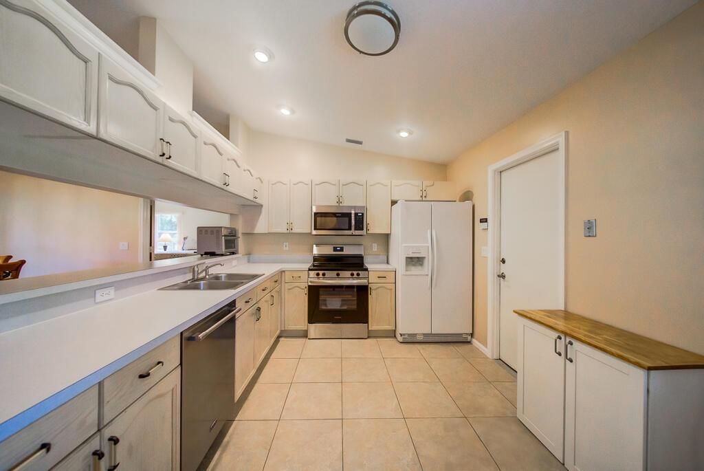 Photo of 15733 Temple Boulevard, Loxahatchee, FL 33470 (MLS # R11125970)