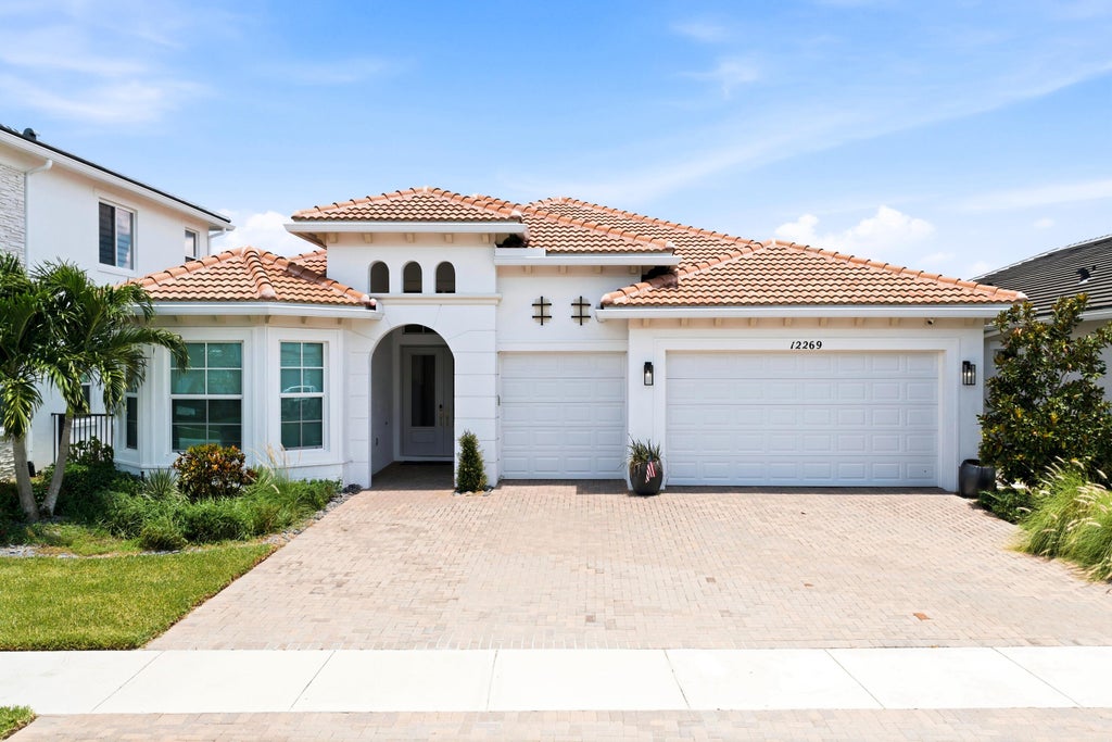 Photo of 12269 Waterstone Circle, Palm Beach Gardens, FL 33412 (MLS # B26056314)