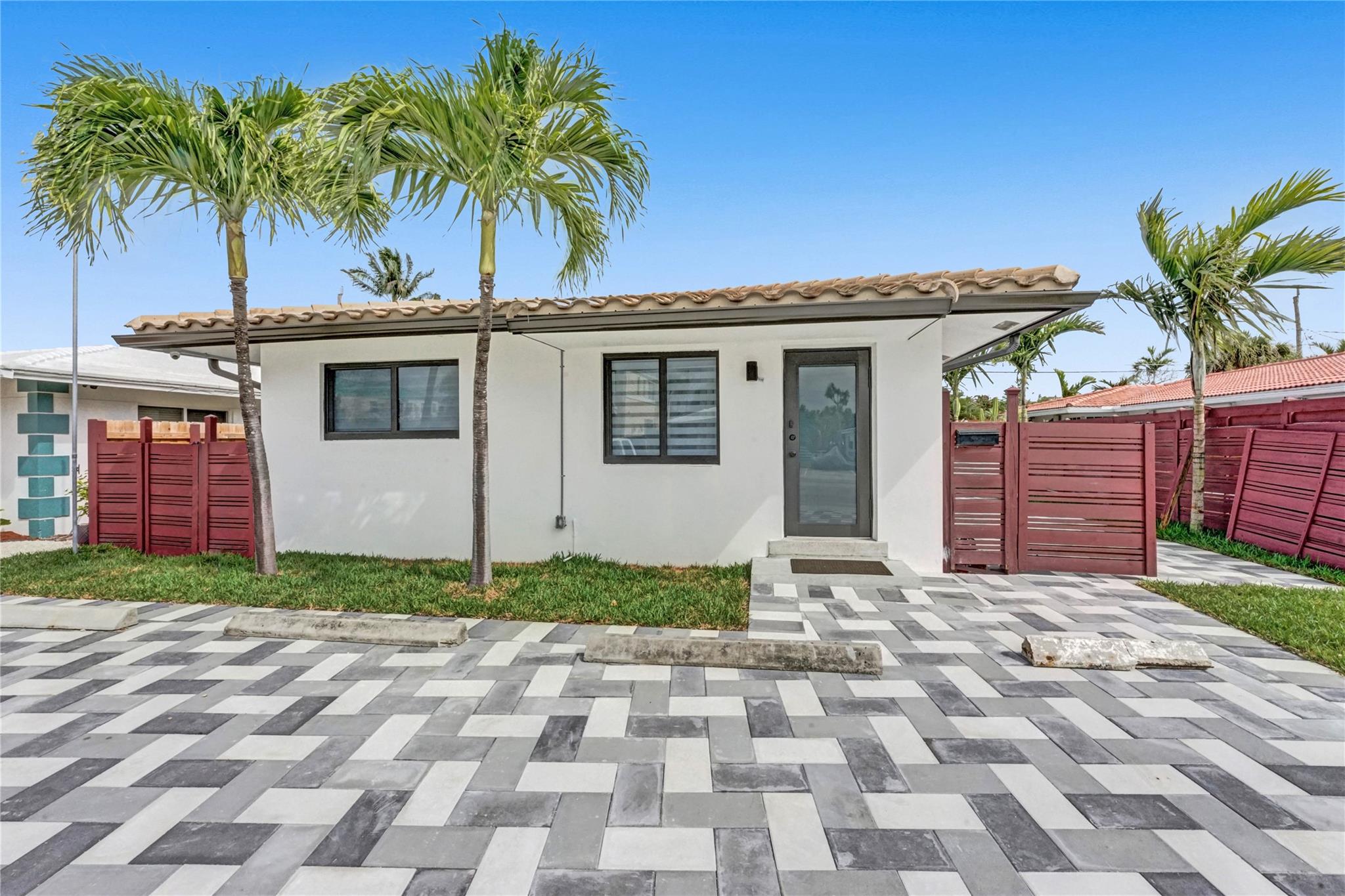 Fully renovated 2-bedroom, 2-bathroom home offering modern comfort and style in a prime beachside location. This residence features elegant all-tile flooring throughout, custom-made doors, and a sleek kitchen designed with quartz countertops and quality finishes. The property comes fully furnished, making it completely move-in ready, and includes a convenient in-unit washer and dryer. Just minutes walking from the beach, you’ll enjoy the best of coastal living with restaurants, shops, and entertainment nearby. Perfect for anyone seeking both luxury and convenience, this home offers a rare opportunity to live in one of the most desirable areas. Whether for full-time living or a seasonal retreat, this property blends modern design with unmatched location.