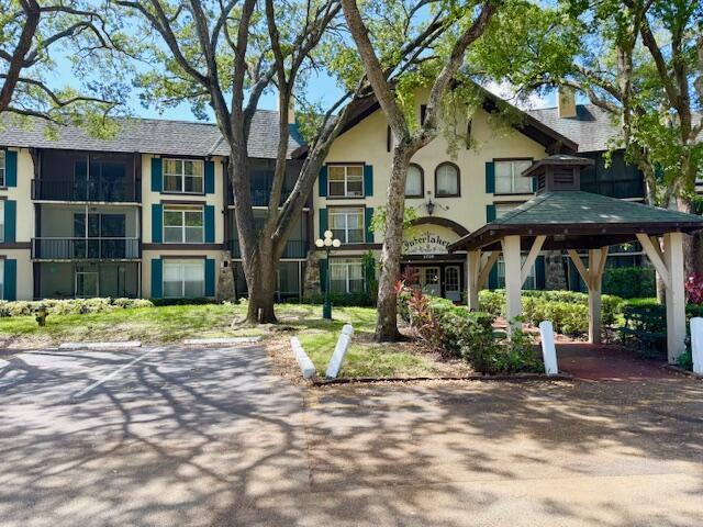 If you are looking for an affordable place to call home, this is your place. Great unit with views of the lake from the primary bedroom and living area. Enjoy your morning coffee on the screened and tiled patio. All sizes are not guaranteed.