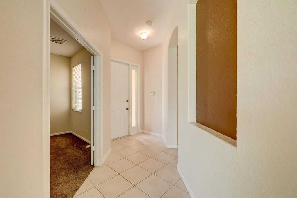 Photo of 688 NW Stanford Lane, Port Saint Lucie, FL 34986 (MLS # R11126600)