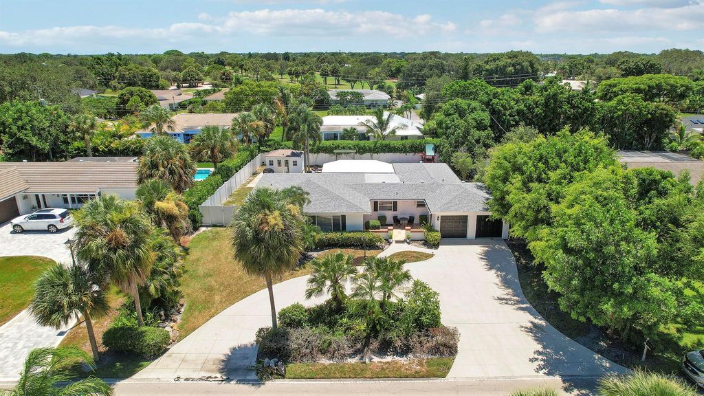 Photo of 335 Country Club Drive, Tequesta, FL 33469 (MLS # R11117340)