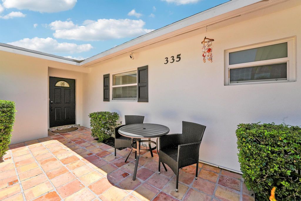 Photo of 335 Country Club Drive, Tequesta, FL 33469 (MLS # R11117340)