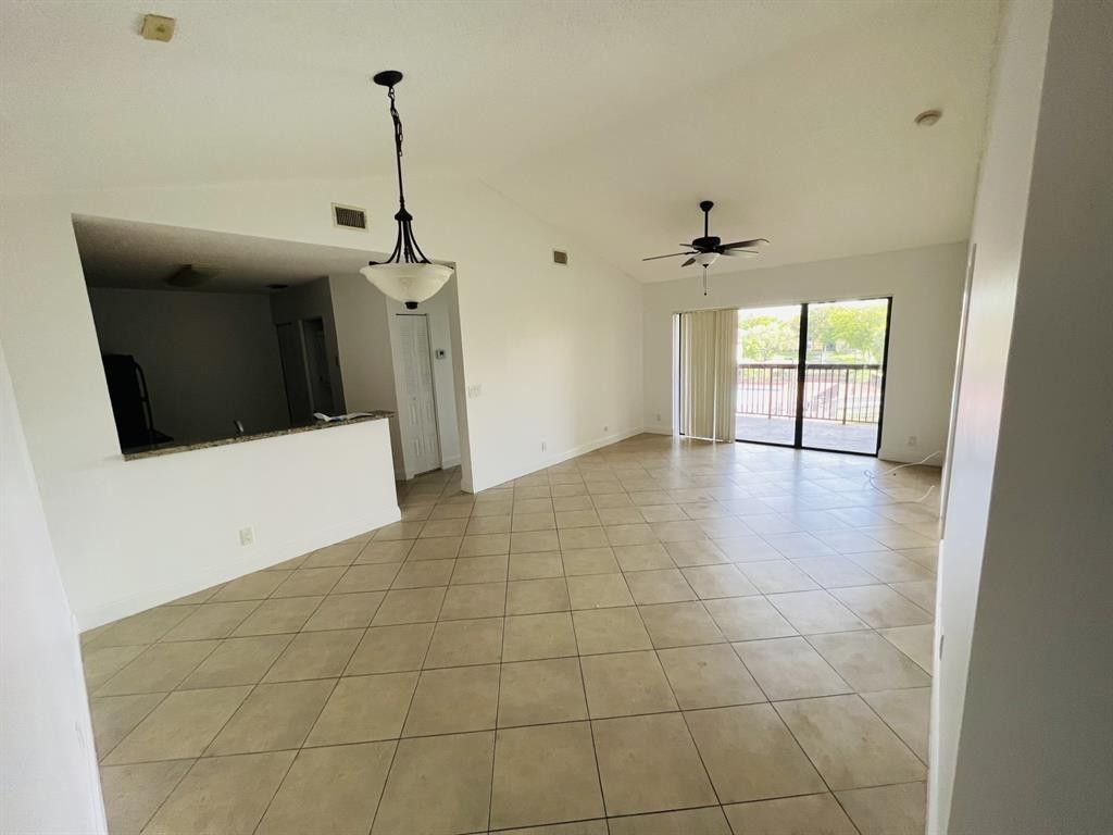 Photo of 5641 Riverside Drive #305B1, Coral Springs, FL 33067 (MLS # F10420850)