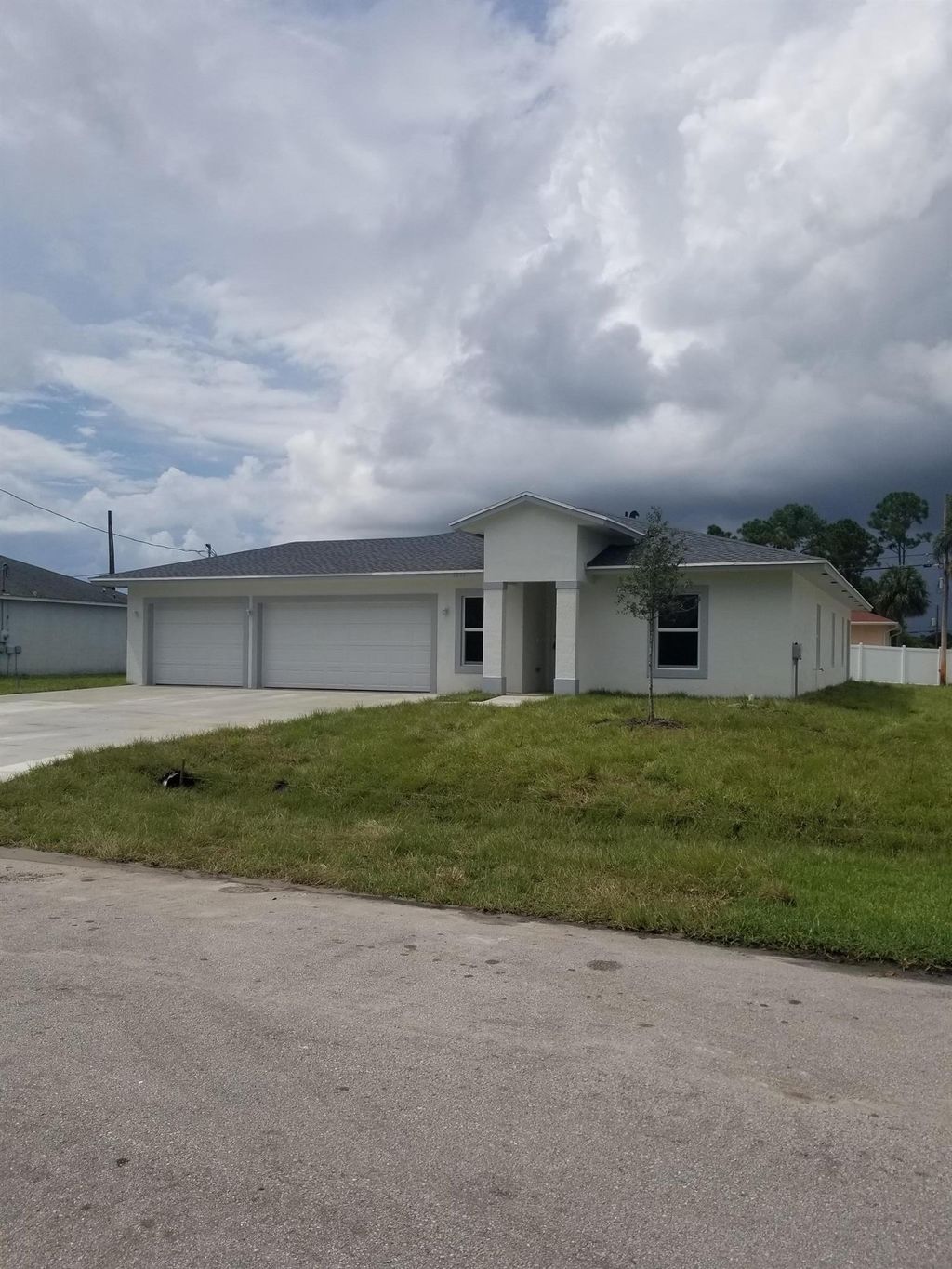 Photo of 1233 SW Medina Avenue, Port St Lucie, FL 34953 (MLS # R10909514)