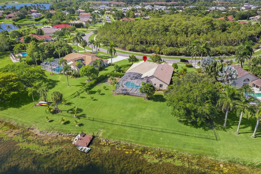 Photo of 9676 Eagle Point Lane, Lake Worth, FL 33467 (MLS # B26027425)