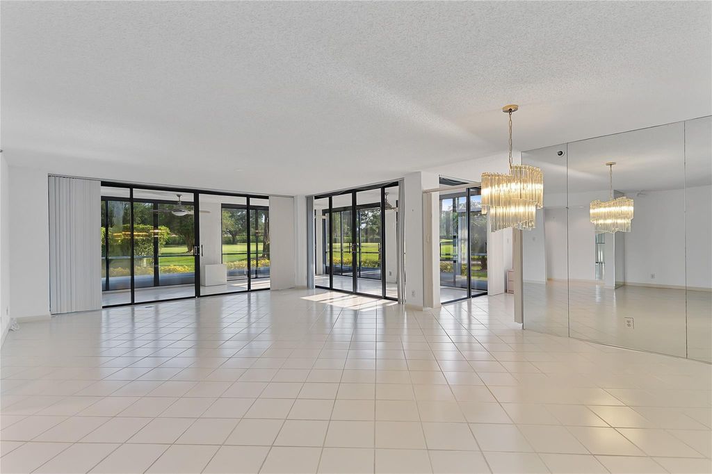 Photo of 7580 Regency Lakes Drive #101, Boca Raton, FL 33433 (MLS # F10501742)