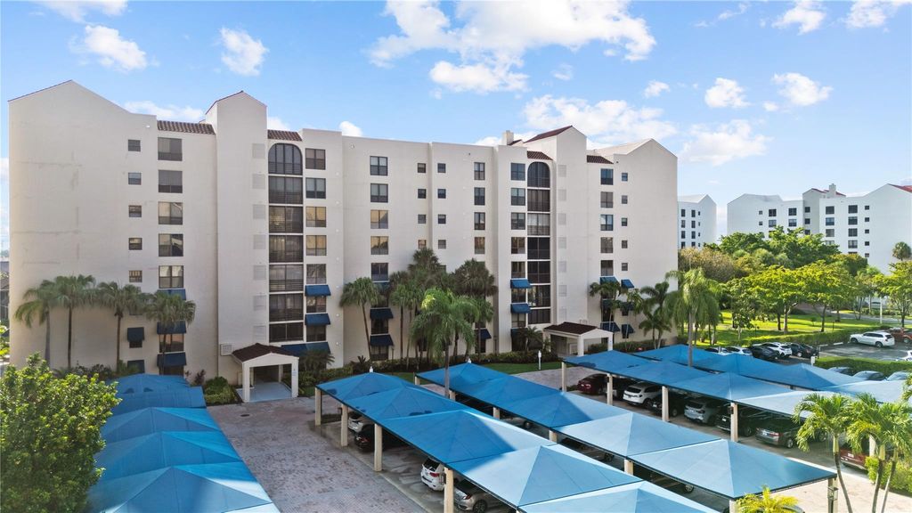Photo of 7580 Regency Lakes Drive #101, Boca Raton, FL 33433 (MLS # F10501742)