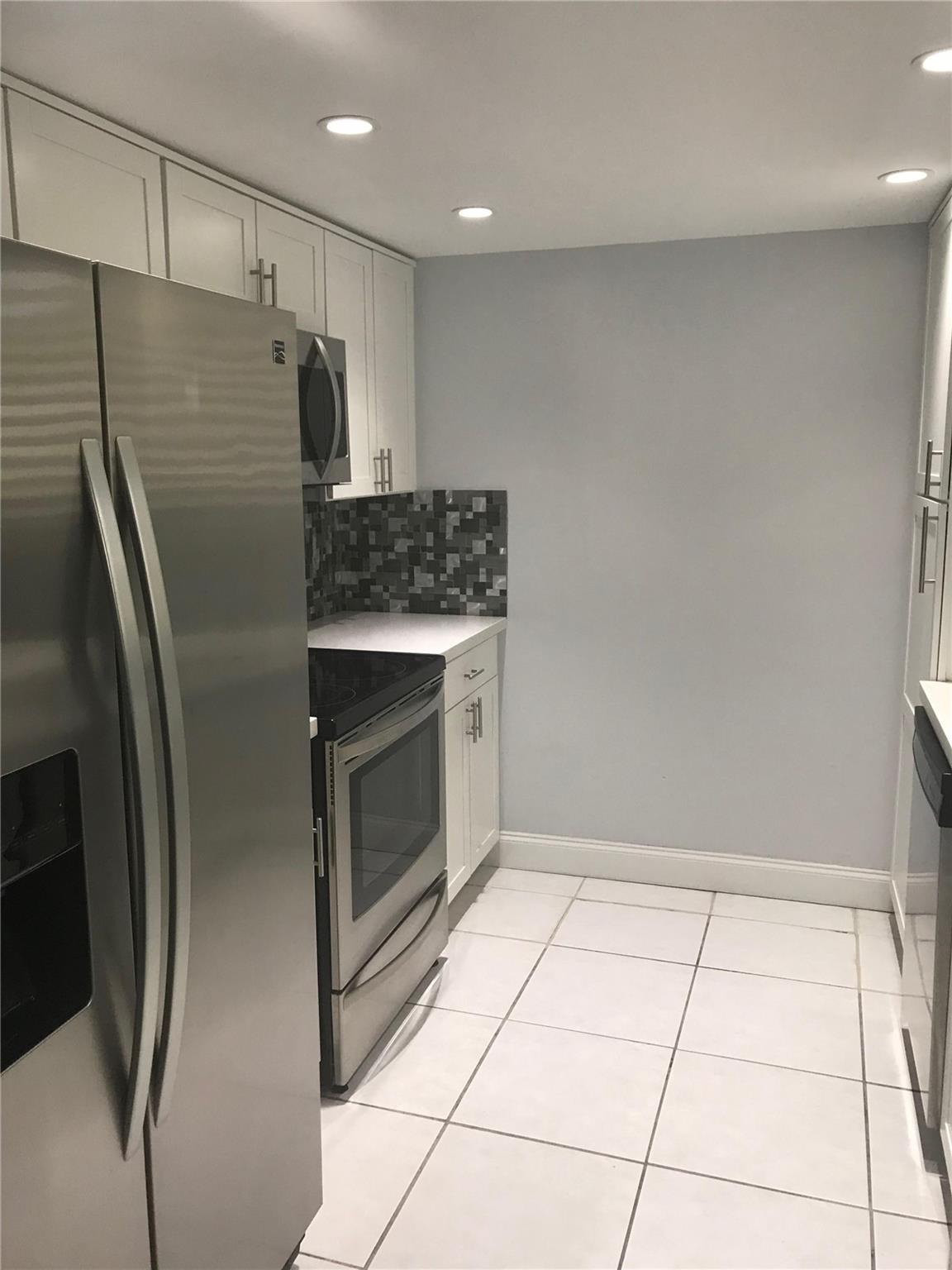 Patios Of Oakwood Condo - Residential Lease