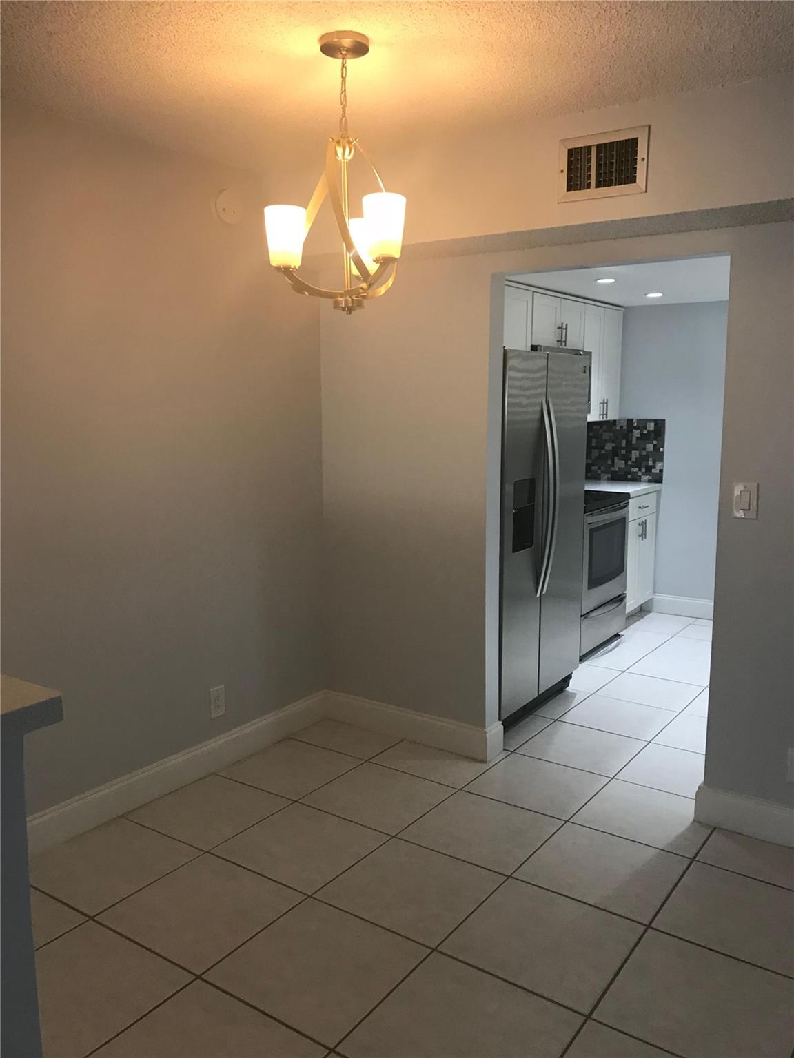 Patios Of Oakwood Condo - Residential Lease