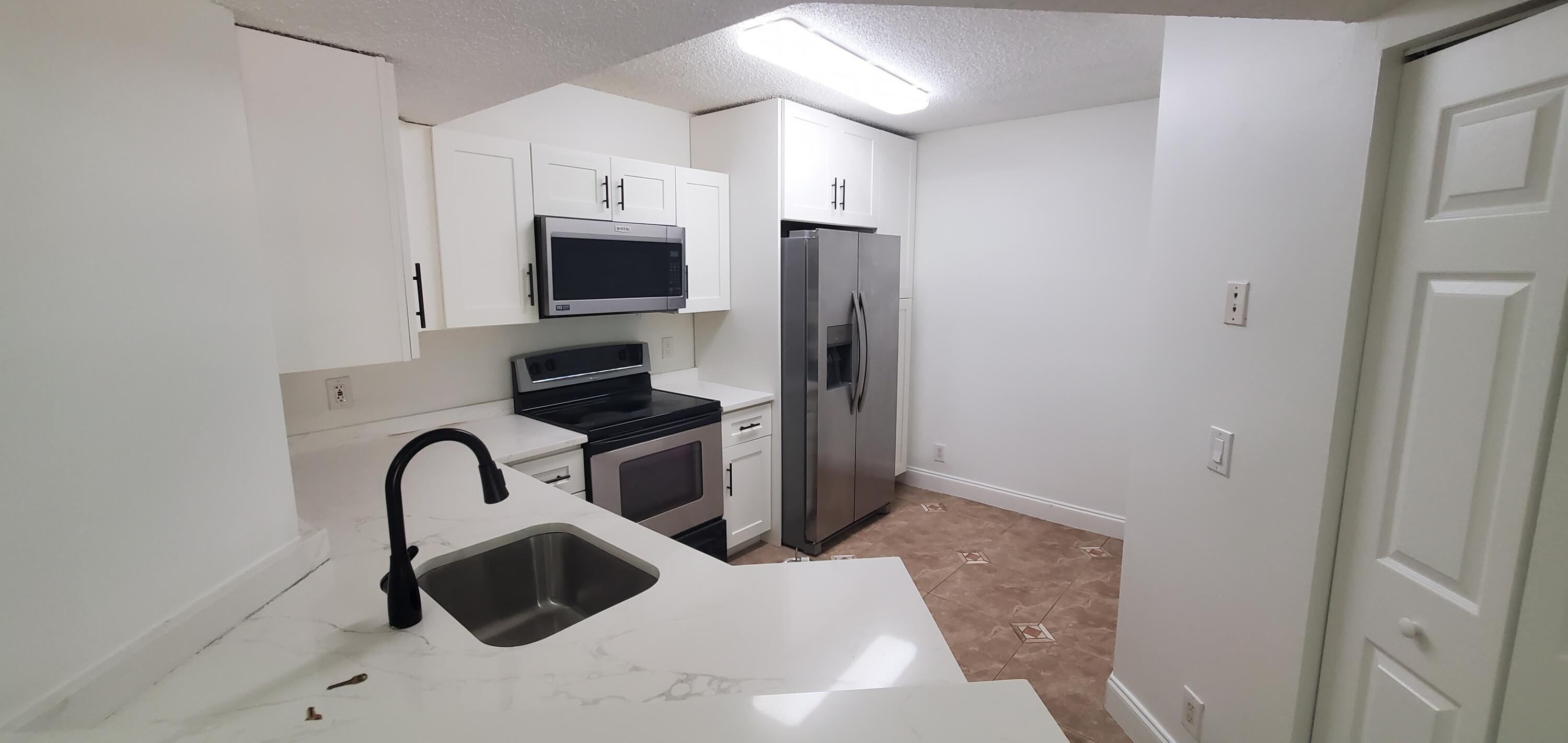 8721 WILES Road 302