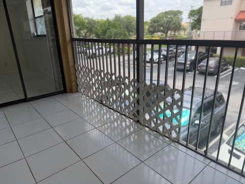 Tiny photo for 2977 Riverside Drive #202, Coral Springs, FL 33065 (MLS # B26036710)