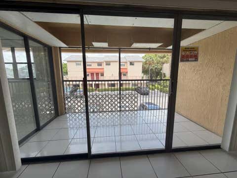 Tiny photo for 2977 Riverside Drive #202, Coral Springs, FL 33065 (MLS # B26036710)