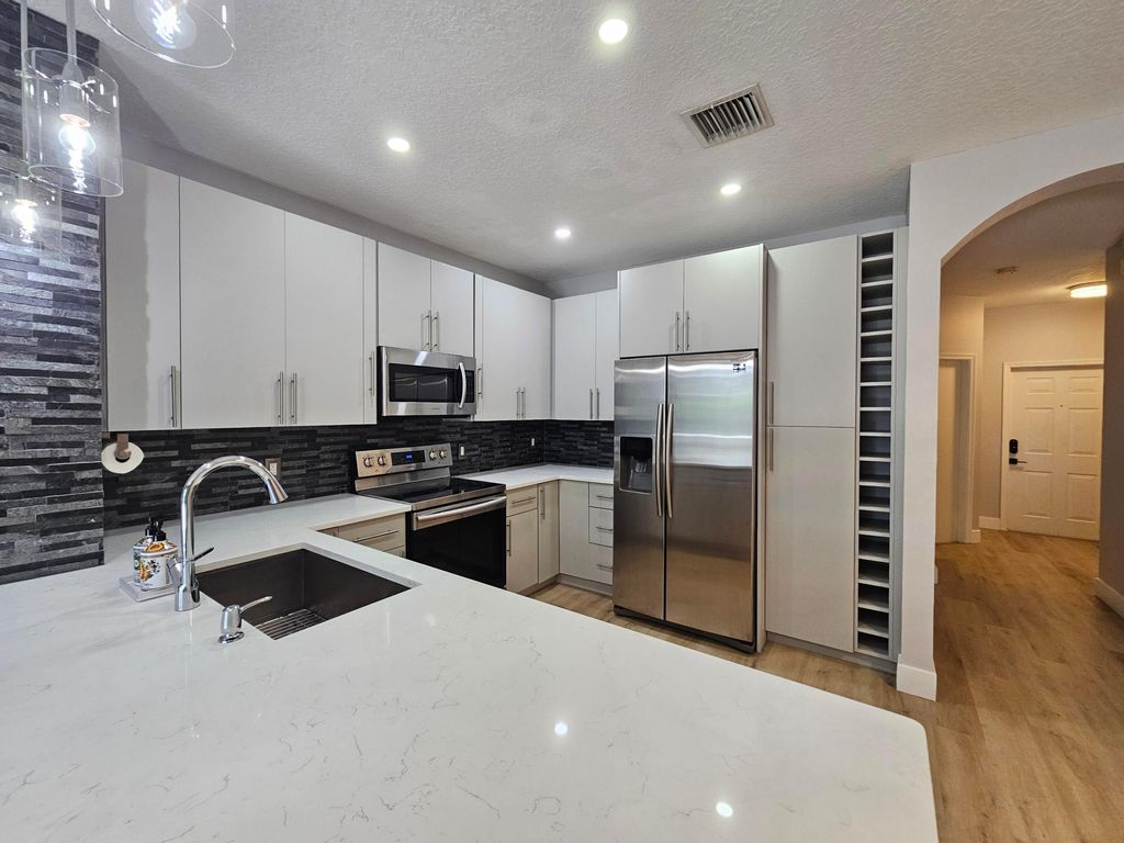 Photo of 9749 Porta Leona Lane, Boynton Beach, FL 33472 (MLS # B26026632)