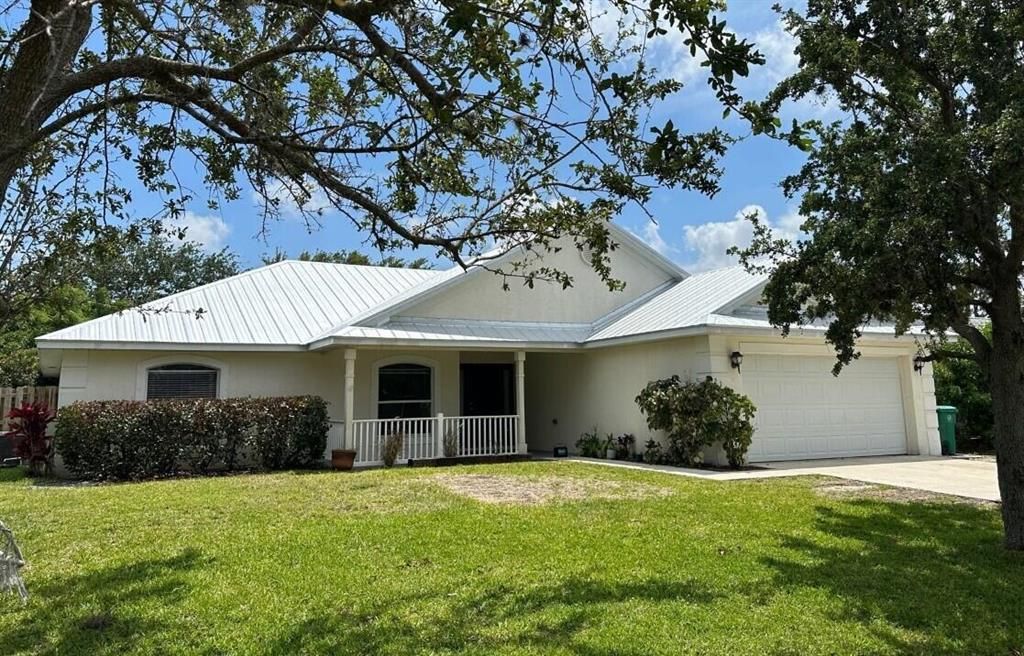 Photo of 210 SW Inwood Avenue, Port St Lucie, FL 34953 (MLS # R10891203)