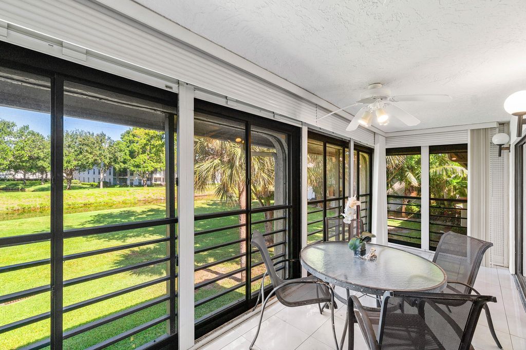 Photo of 10137 Mangrove Drive #203, Boynton Beach, FL 33437 (MLS # B26023137)