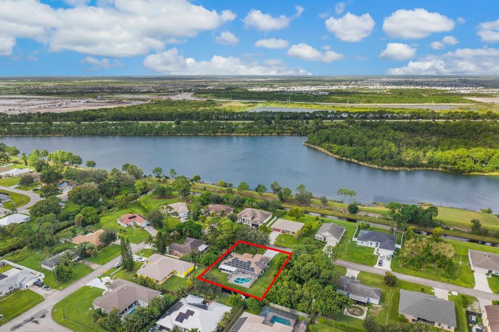 Photo of 3461 SW Esperanto Street, Port Saint Lucie, FL 34953 (MLS # R11131314)